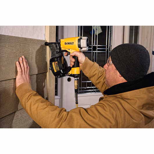 Using Dewalt 15° Coil Siding And Fencing Nailer for rent